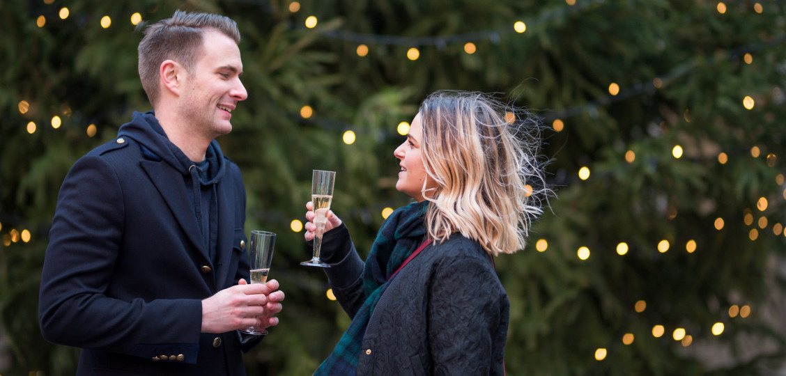 Couple with a glass of Champagne PIAFF